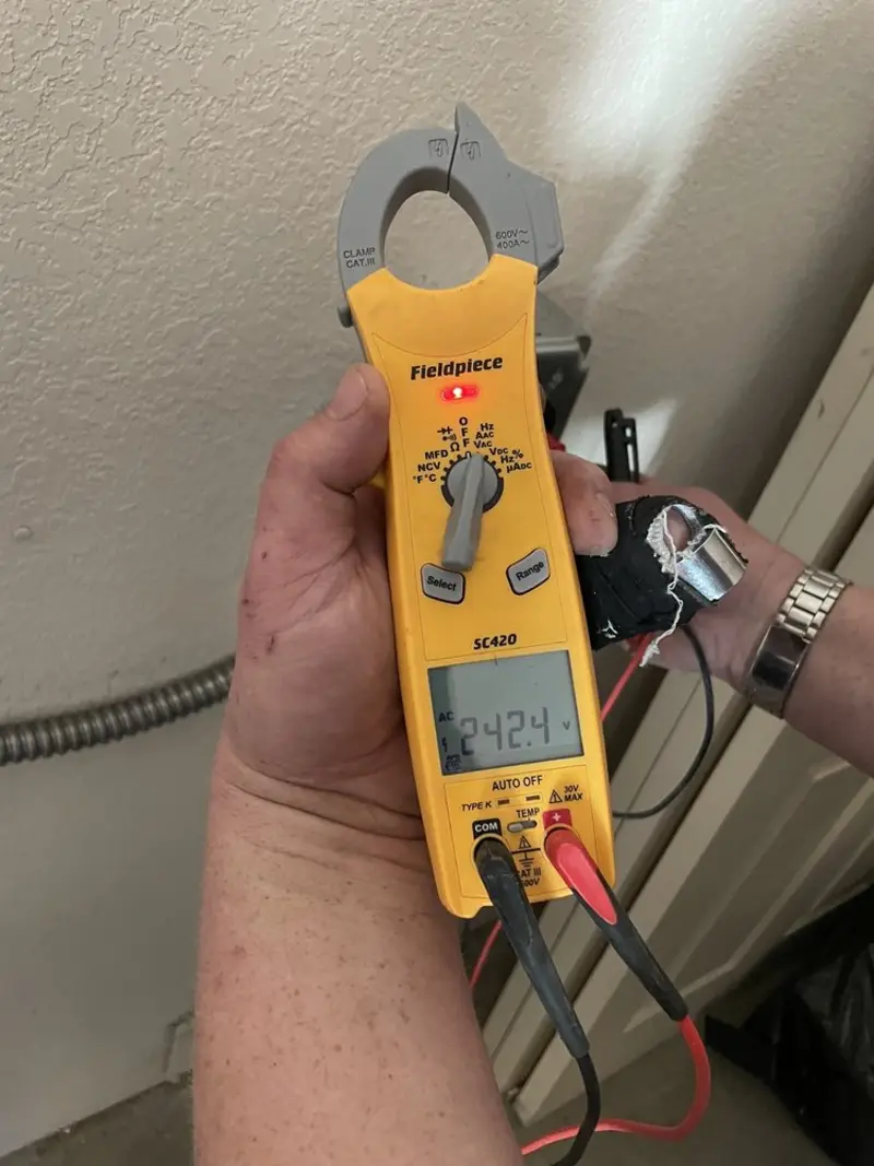 Voltage testing with clamp meter during Generator Installation in Lower Burrell